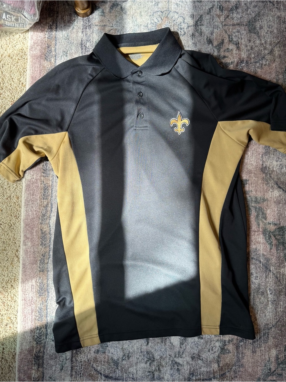 NFL Black and Gold Short-Sleeve Polo with Team Fleur-de-Lis Patch